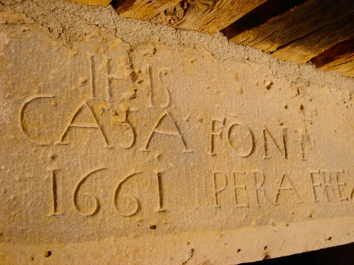 La masia · Llinda de 1661